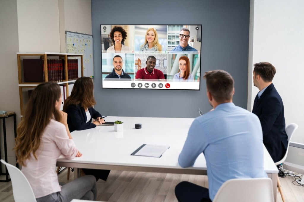 hybrid-meeting-shutterstock_1818069584-smaller-1-1536×1024